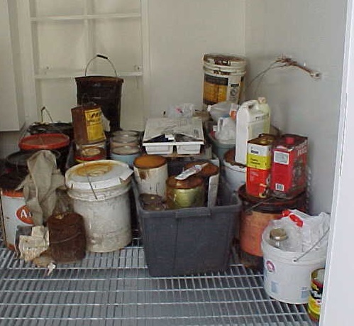 a collection of hazardous waste containers