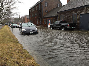 Cars submerged in water during a flooding event in Portsmouth, NH