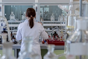 a woman works in a lab