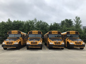 Four propane powered school buses