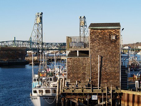 fishing boats and pier in the foreground, Memorial Bridge in the background.