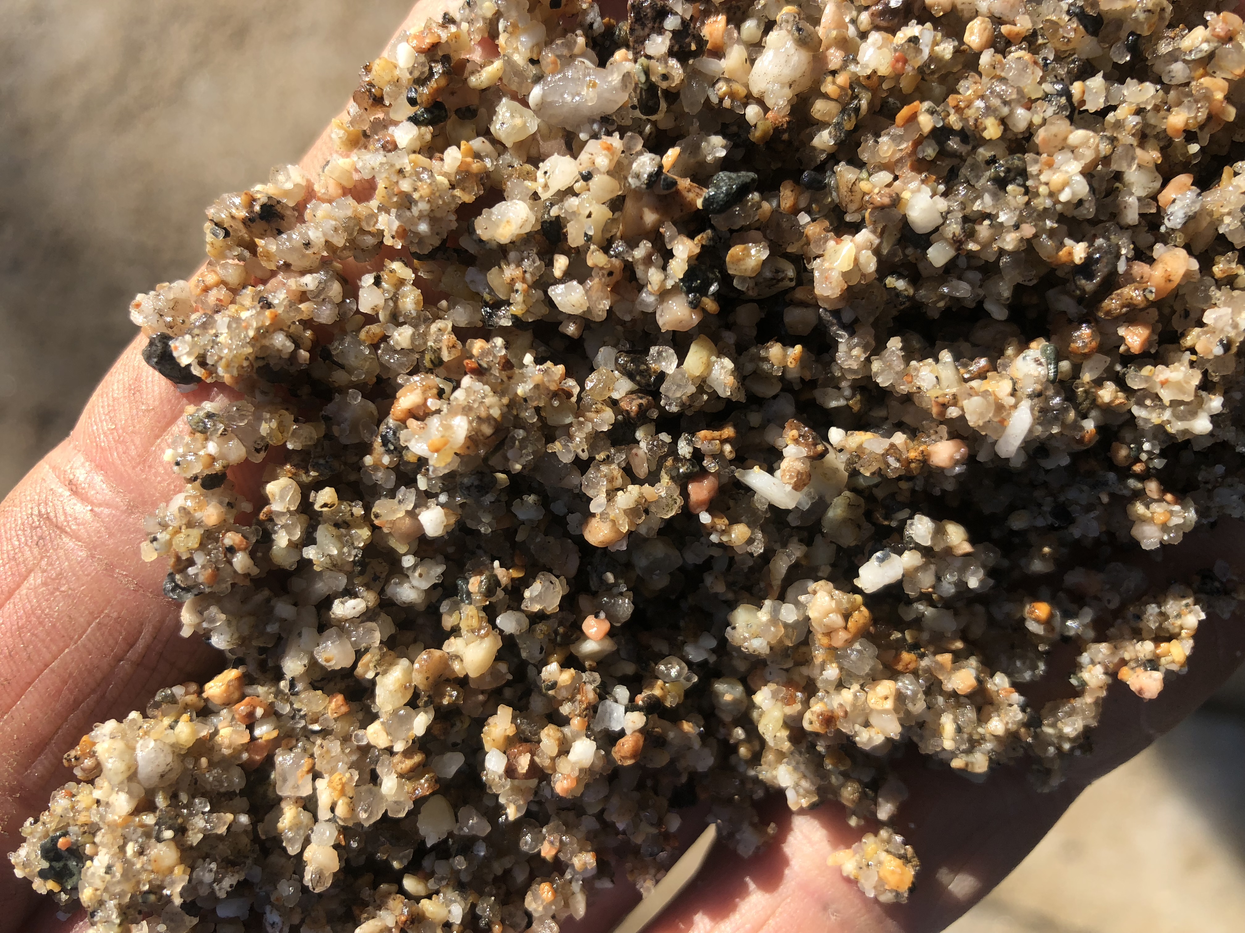 a handful of sand and gravel.