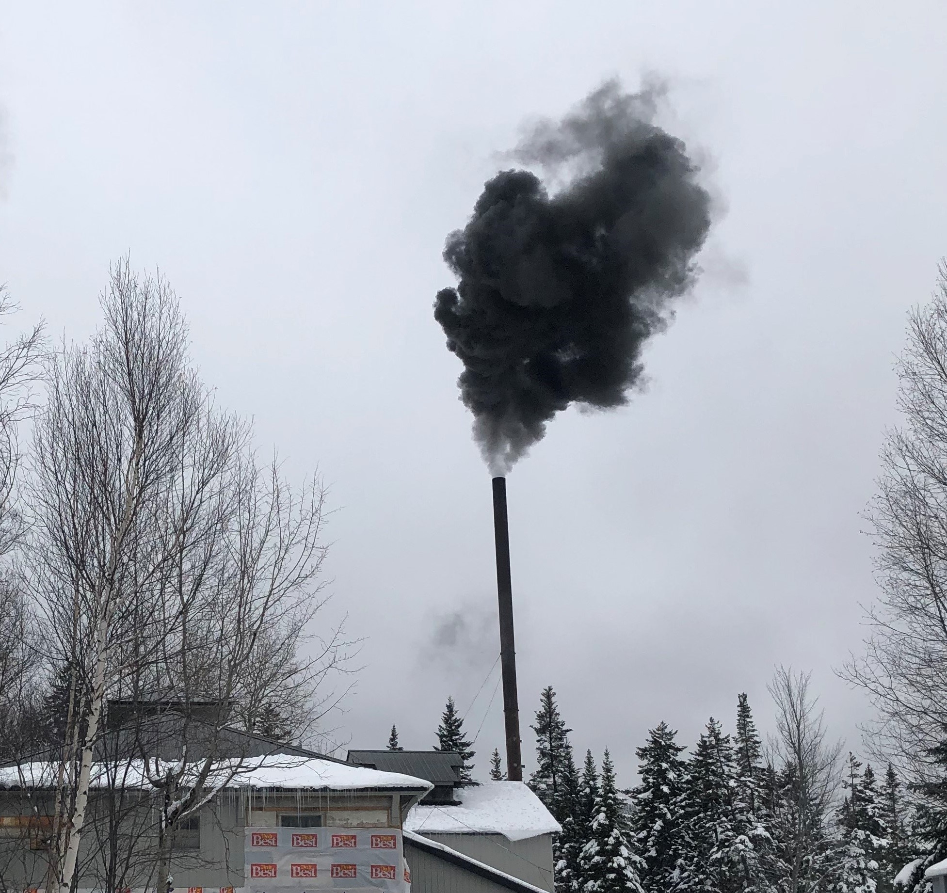 Black Smoke Plume from Malfunctioning Boiler   