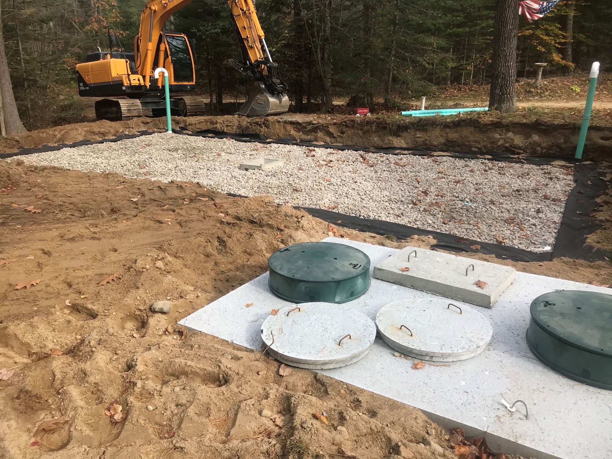 an image showing the installation of septic system pipes 