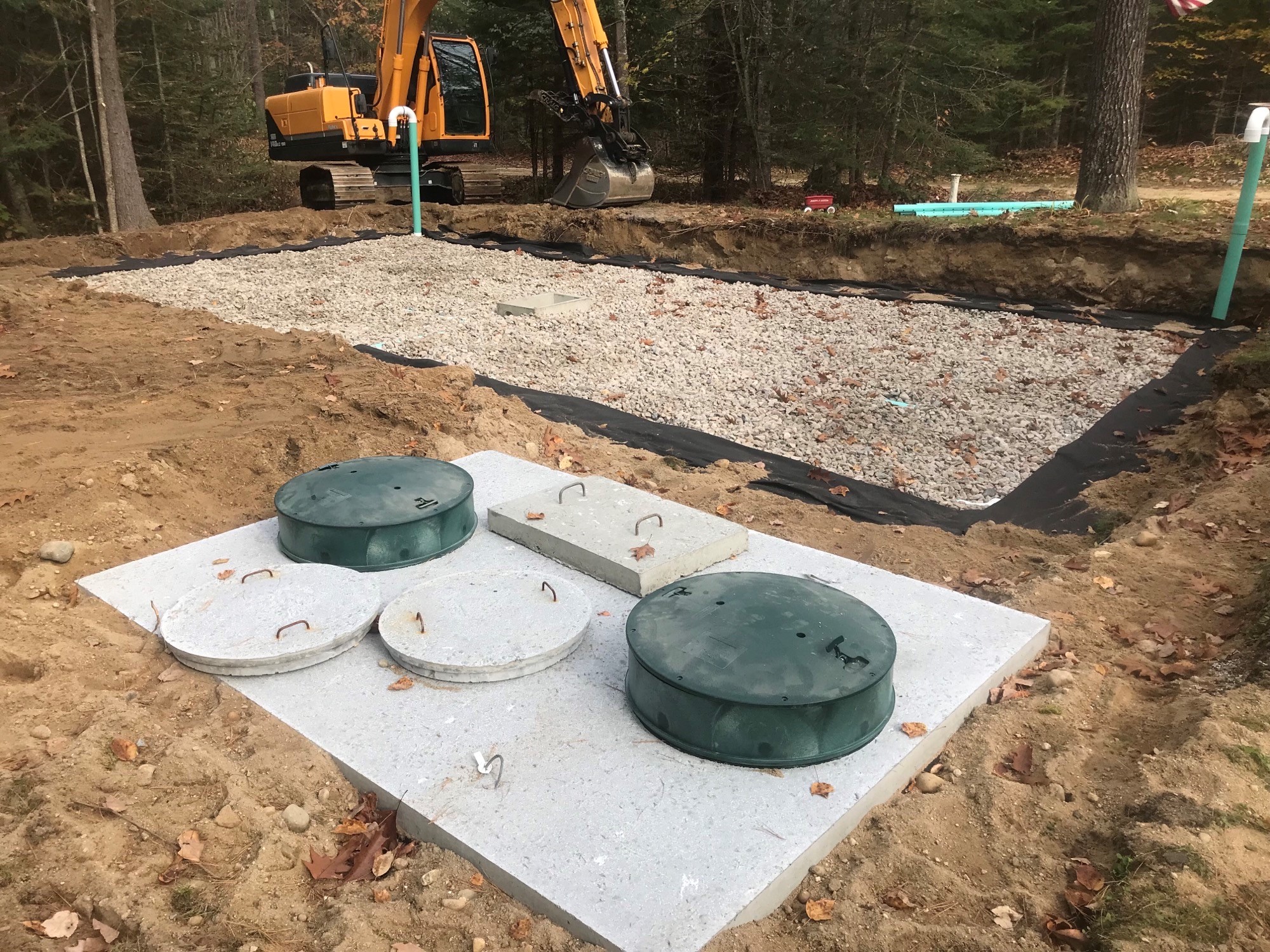 an image showing the installation of septic system pipes