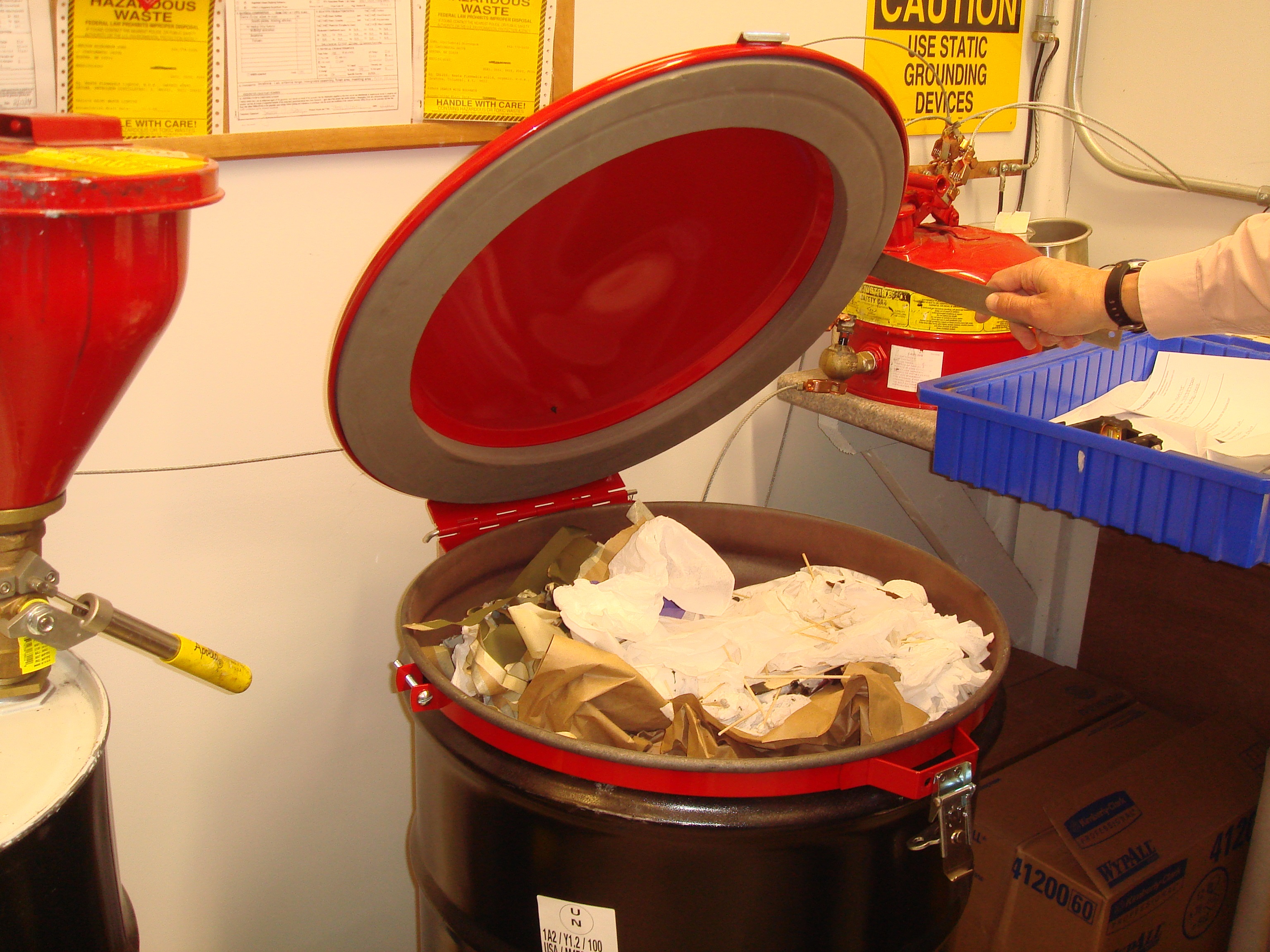 properly sealed hazardous waste containers