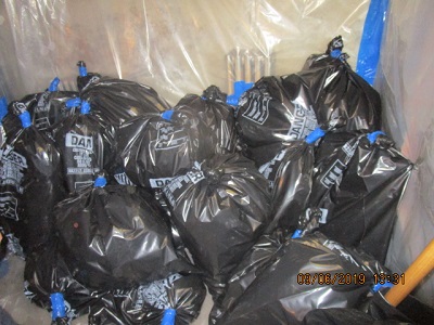 bags of waste in a pile