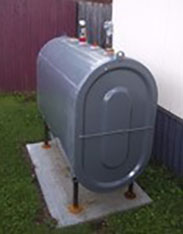 photo of vertically installed end view of aboveground home heating oil tank