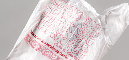 white plastic bag with red text
